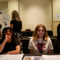 Four East Kentwood students sit at their project table